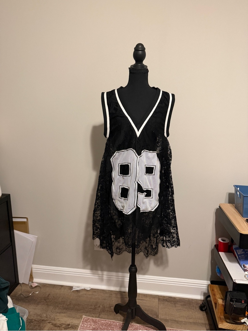 AKIRA Black Lace V-Neck Crop Top with White Number Appliqué